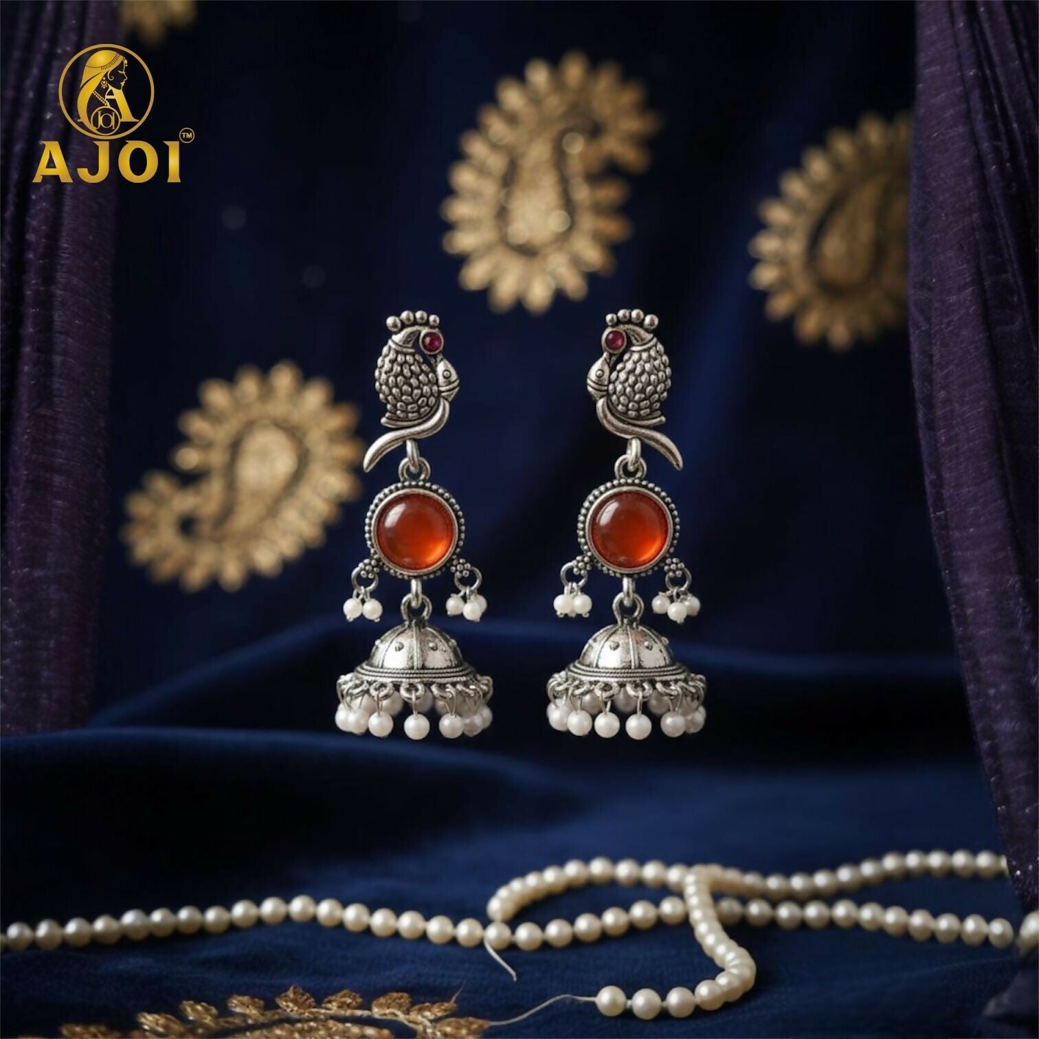 Peacock Jhumka Earrings – Antique Silver with Red Stone & Pearls