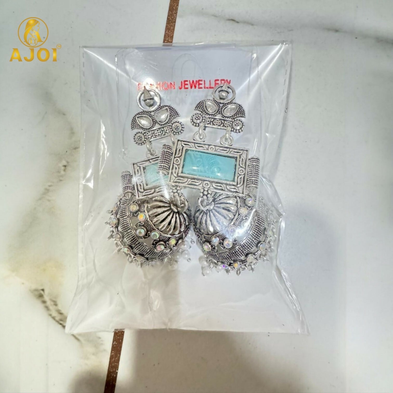 Oxidized Silver Jhumka Earrings – Hand-Carved Aqua Stone & Pearl Drops