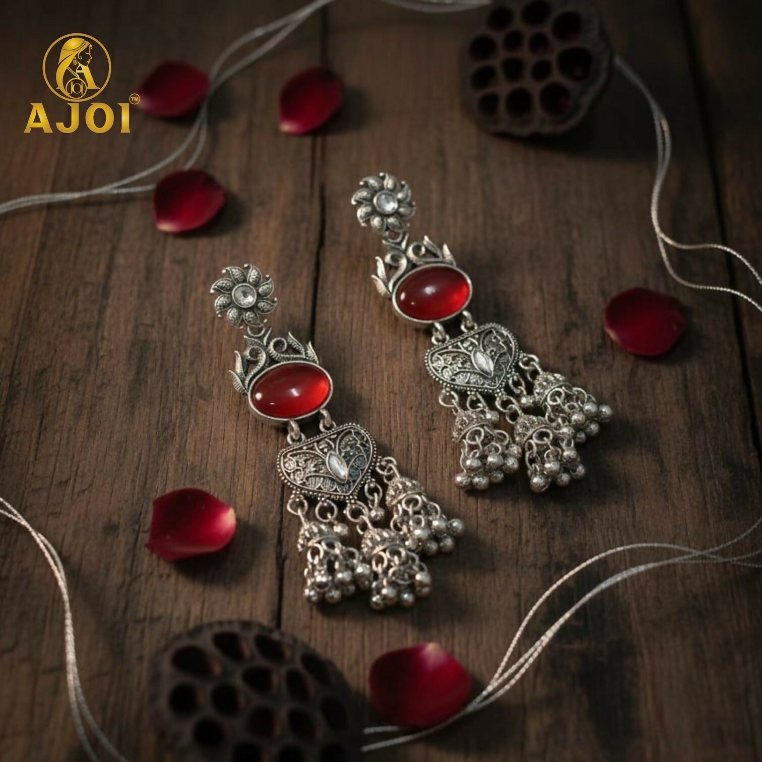 Oxidized Silver Jhumka Earrings – Red Stone & Ornate Filigree