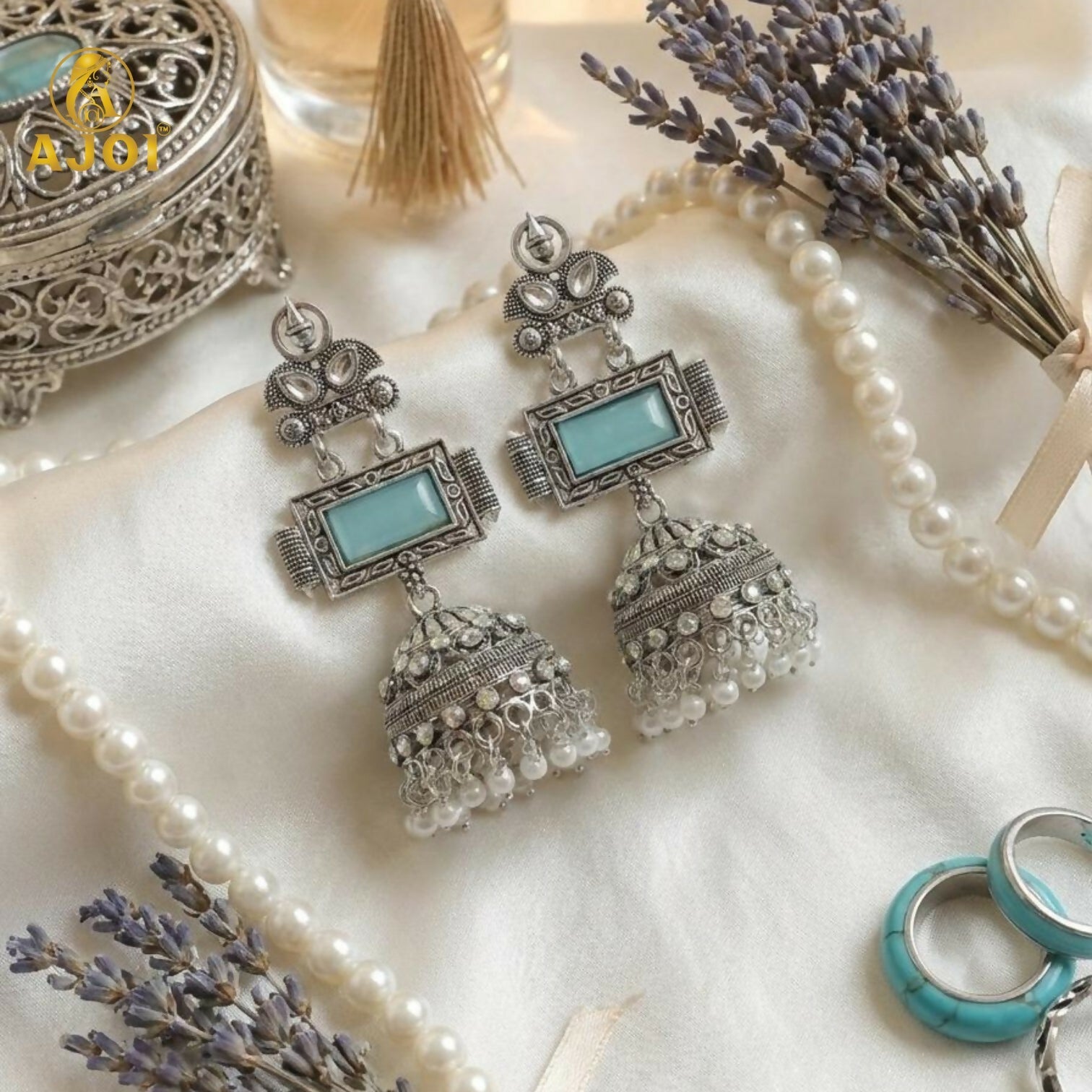 Oxidized Silver Jhumka Earrings – Hand-Carved Aqua Stone & Pearl Drops