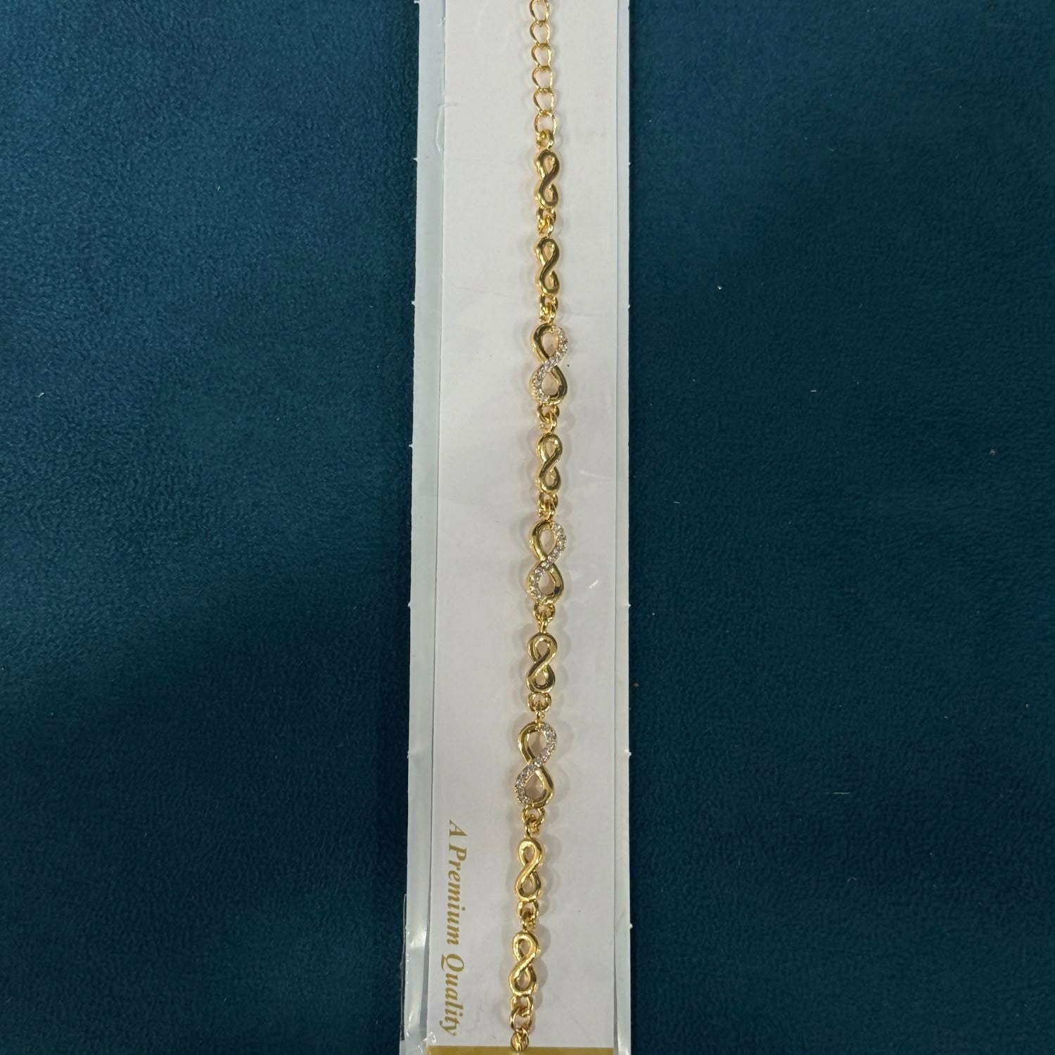 Gold-Tone Infinity Link Bracelet with Crystal Accents and Adjustable Chain for Women