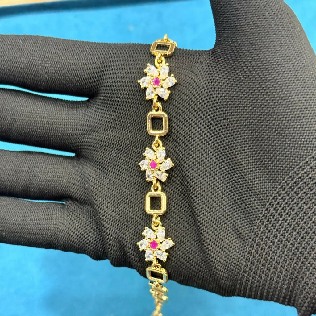 Gold-Tone Flower Link Bracelet with Pink Stones, Crystal Petals and Square Accents