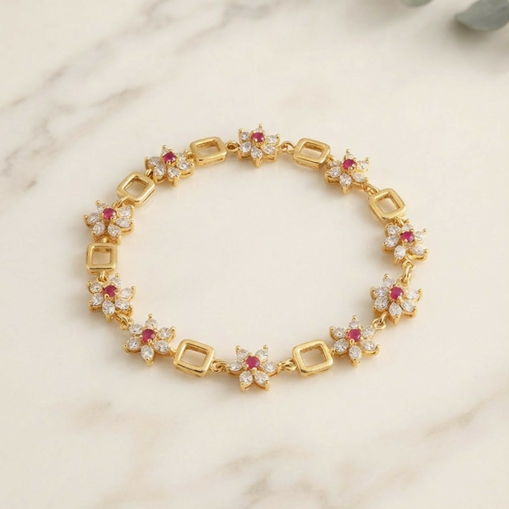 Gold-Tone Flower Link Bracelet with Pink Stones, Crystal Petals and Square Accents