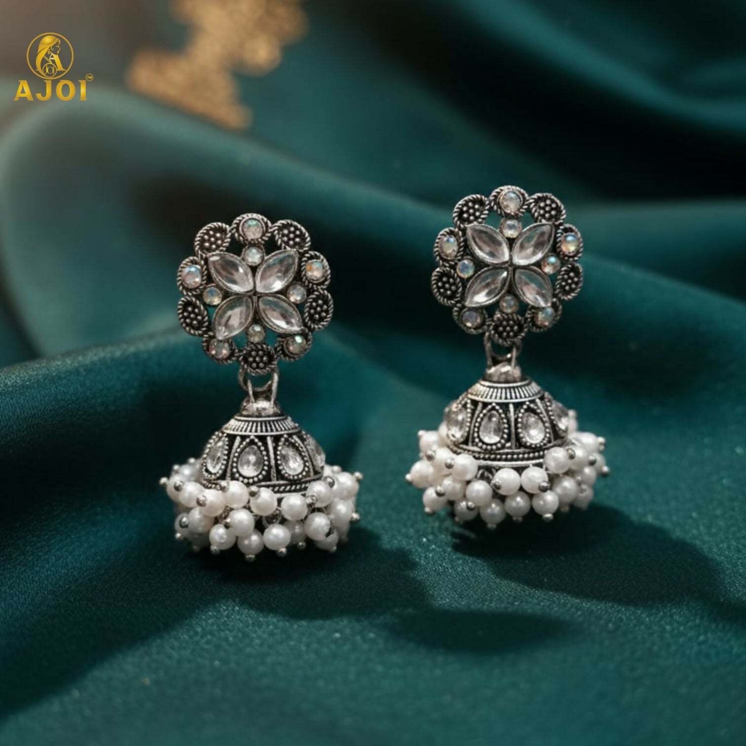 Silver Oxidized Floral Jhumka Earrings – Elegant Pearl Drops Design