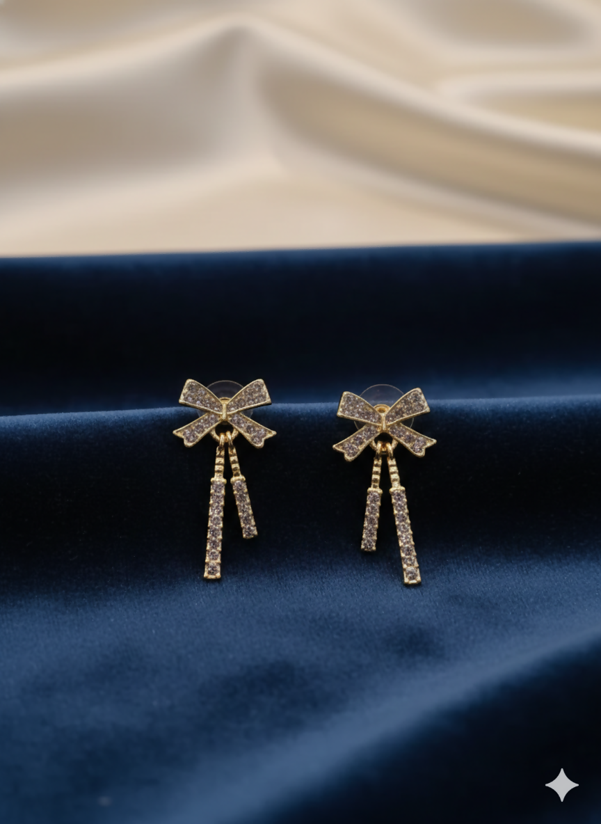 Golden Tassel Earrings – Elegant Bow-Knot Diamond Design