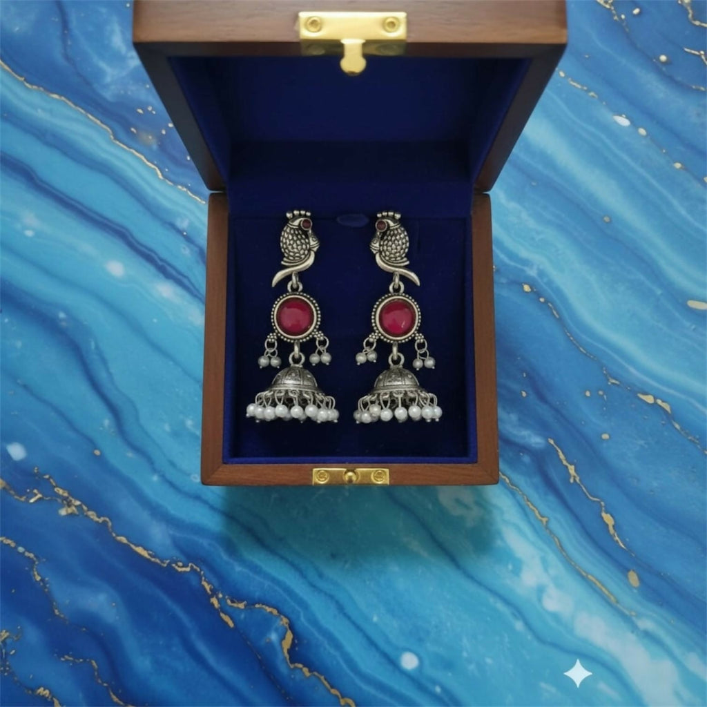 Peacock Jhumka Earrings – Antique Silver with Pink Stone & Pearl Drops