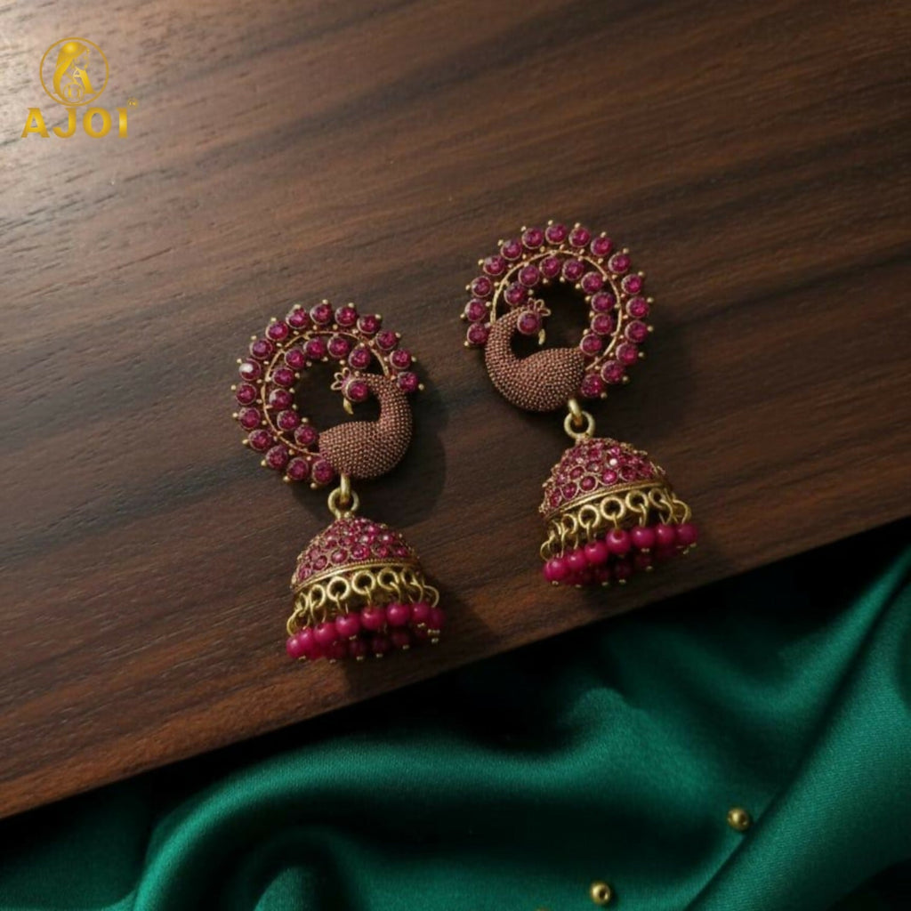 Peacock Motif Jhumka Earrings – Ruby-Tone Antique Gold Finish