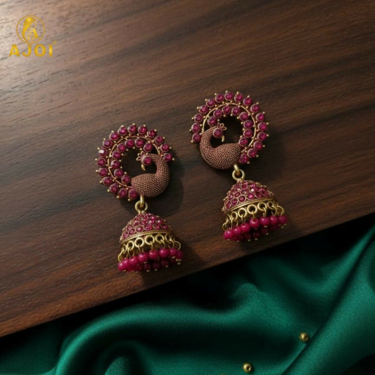 Peacock Motif Jhumka Earrings – Ruby-Tone Antique Gold Finish