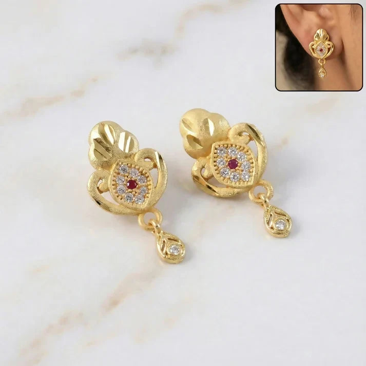 Gold Stud Earrings with Ethnic Floral Motif and Elegant Drop
