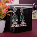 Green Stone Jhumka Earrings – Oxidised Silver Parrot Design