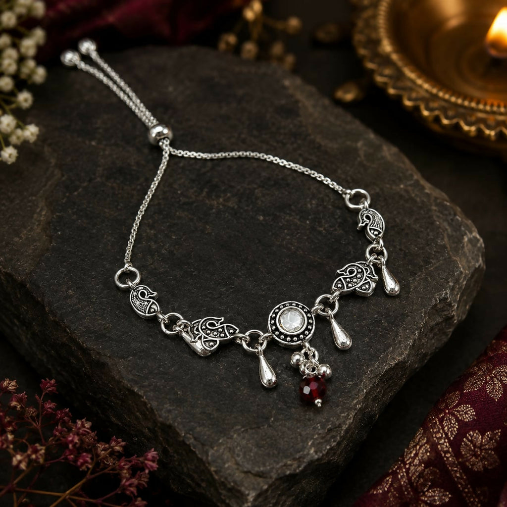 Oxidized Silver Peacock Bracelet with Kundan Stone & Red Bead Charms Adjustable Chain