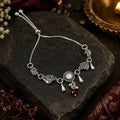 Oxidized Silver Peacock Bracelet with Kundan Stone & Red Bead Charms Adjustable Chain