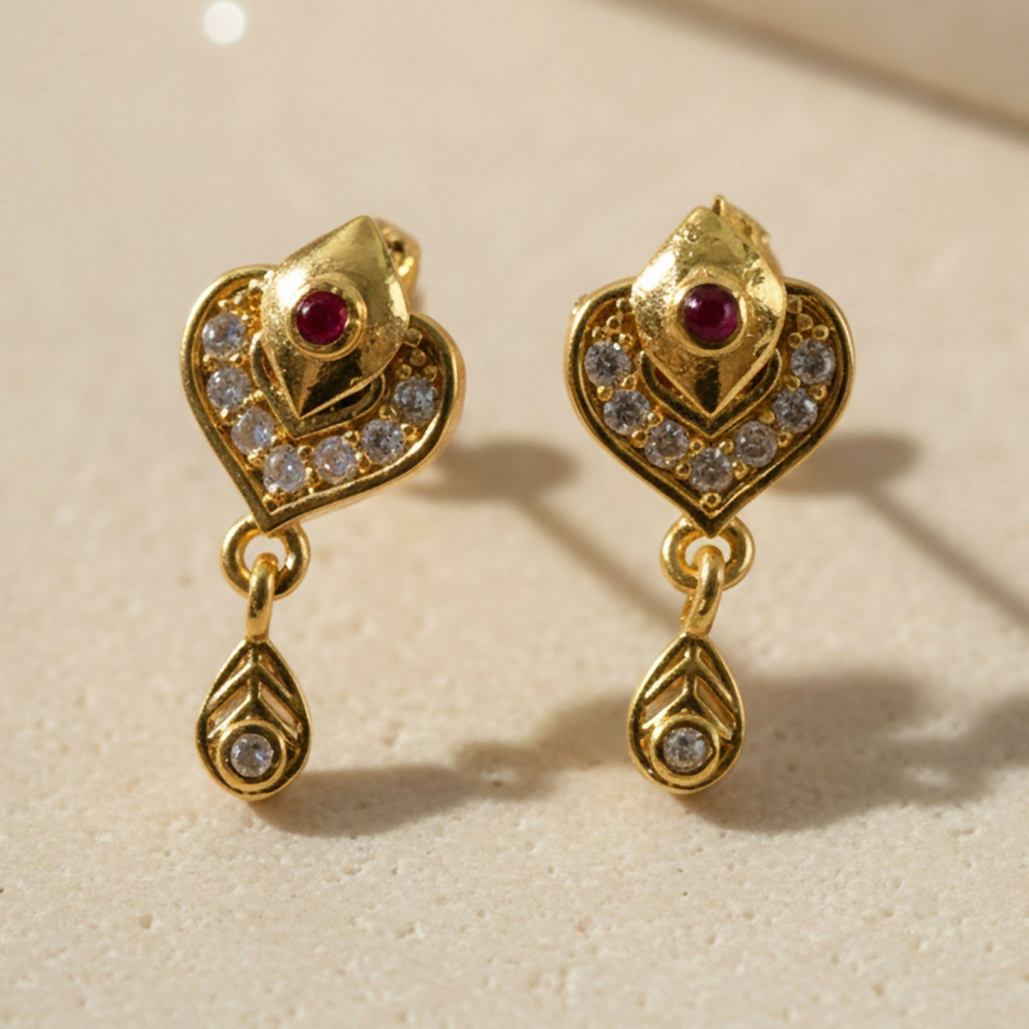 Gold Heart Drop Earrings with Ruby & Crystal Accents – Elegant Design