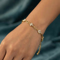 Delicate Gold-Tone Three Leaf Bracelet with Crystal Accents and Adjustable Chain
