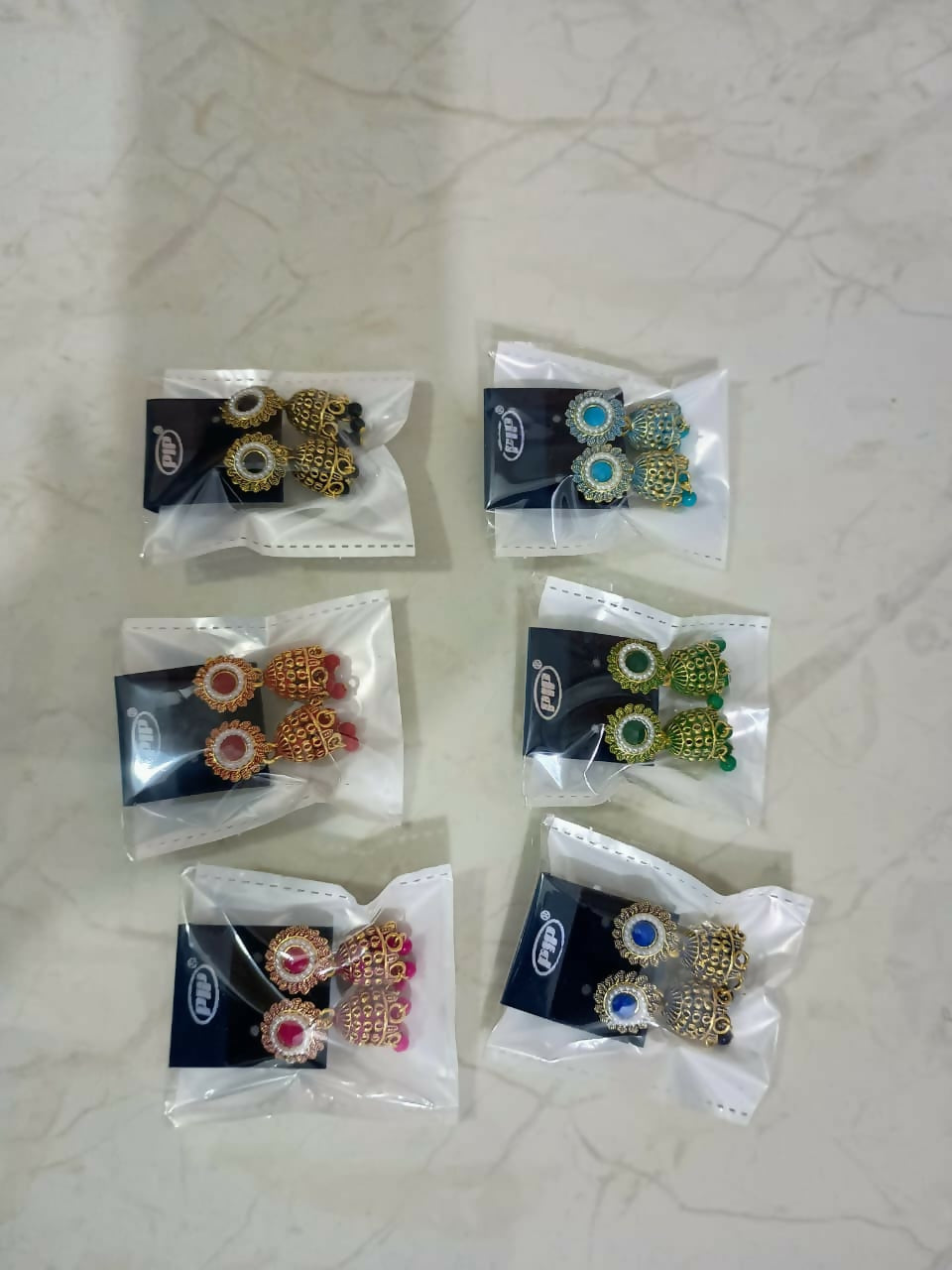 Multicolor Stone Jhumka Earrings – Elegant & Traditional Design