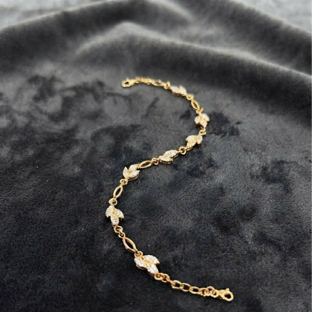 Delicate Gold-Tone Three Leaf Bracelet with Crystal Accents and Adjustable Chain