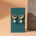 Pearl Drop Swan Stud Earrings – Elegant Crystal & Gold Finish
