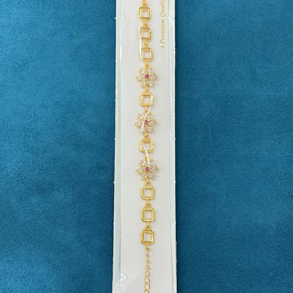 Gold-Tone Flower Link Bracelet with Pink Stones, Crystal Petals and Square Accents