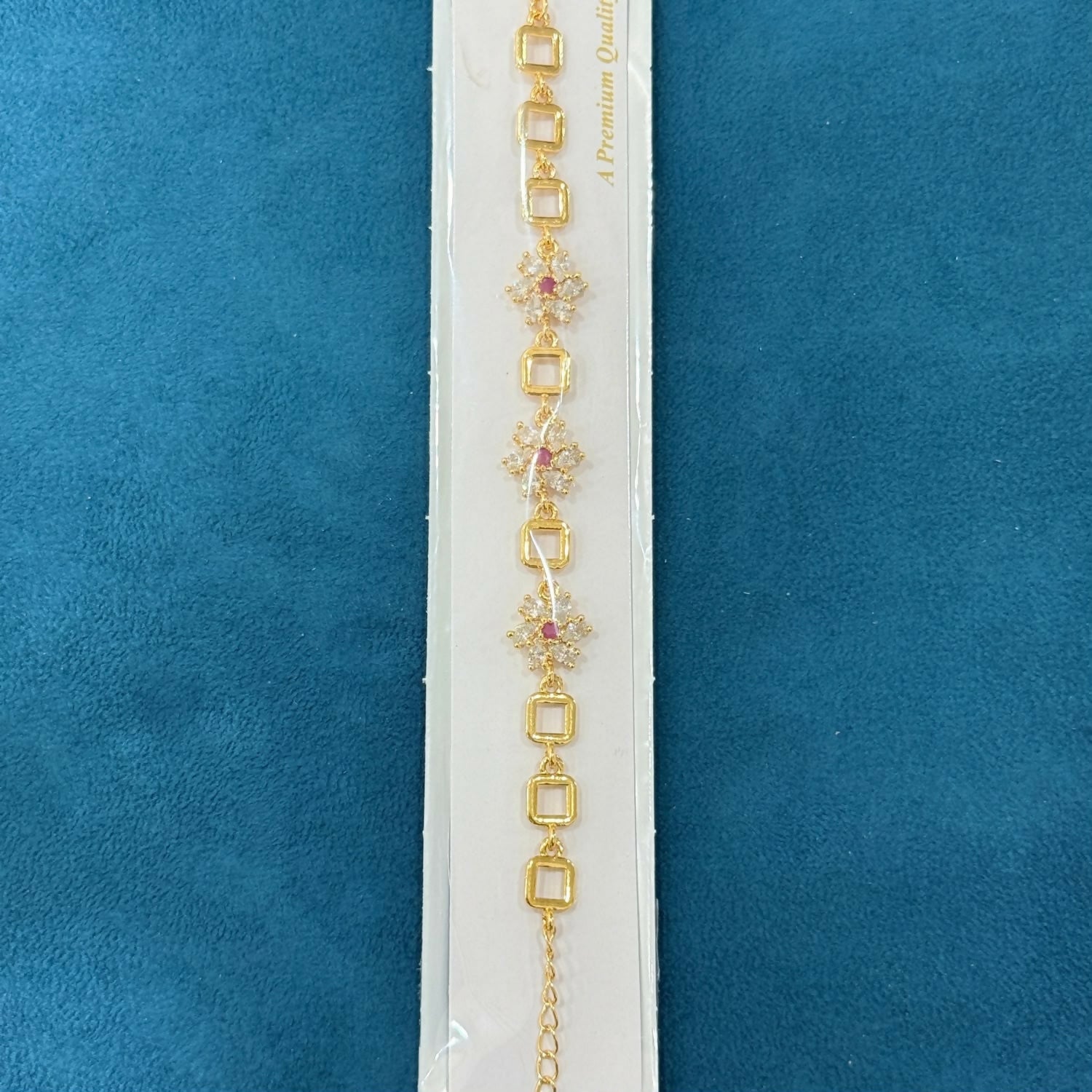 Gold-Tone Flower Link Bracelet with Pink Stones, Crystal Petals and Square Accents