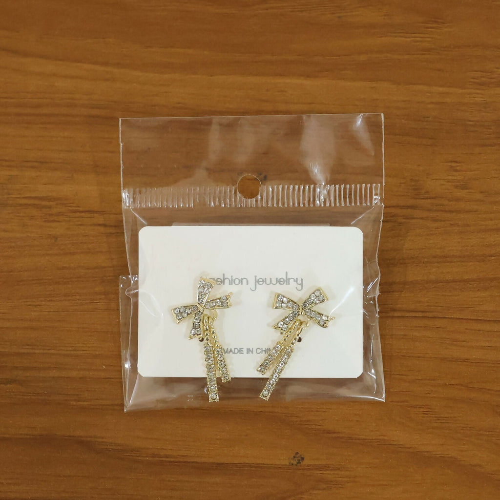 Golden Tassel Earrings – Elegant Bow-Knot Diamond Design