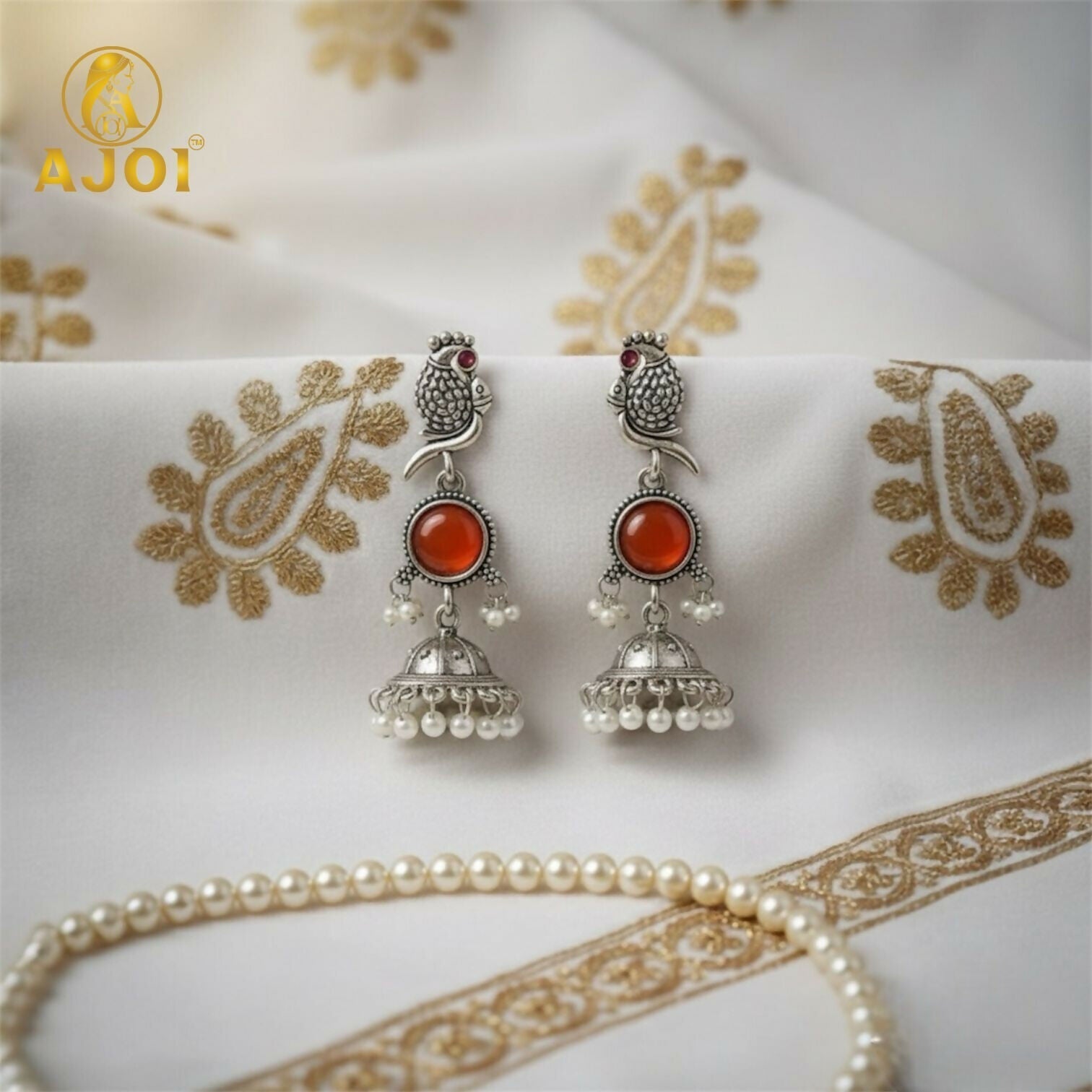Peacock Jhumka Earrings – Antique Silver with Red Stone & Pearls