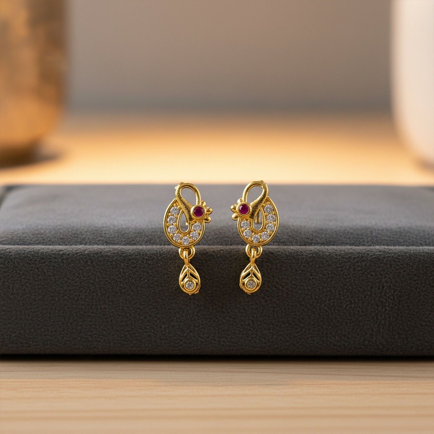 Gold Finish Earrings with Crystal & Red Stone Detailing – Elegant Style