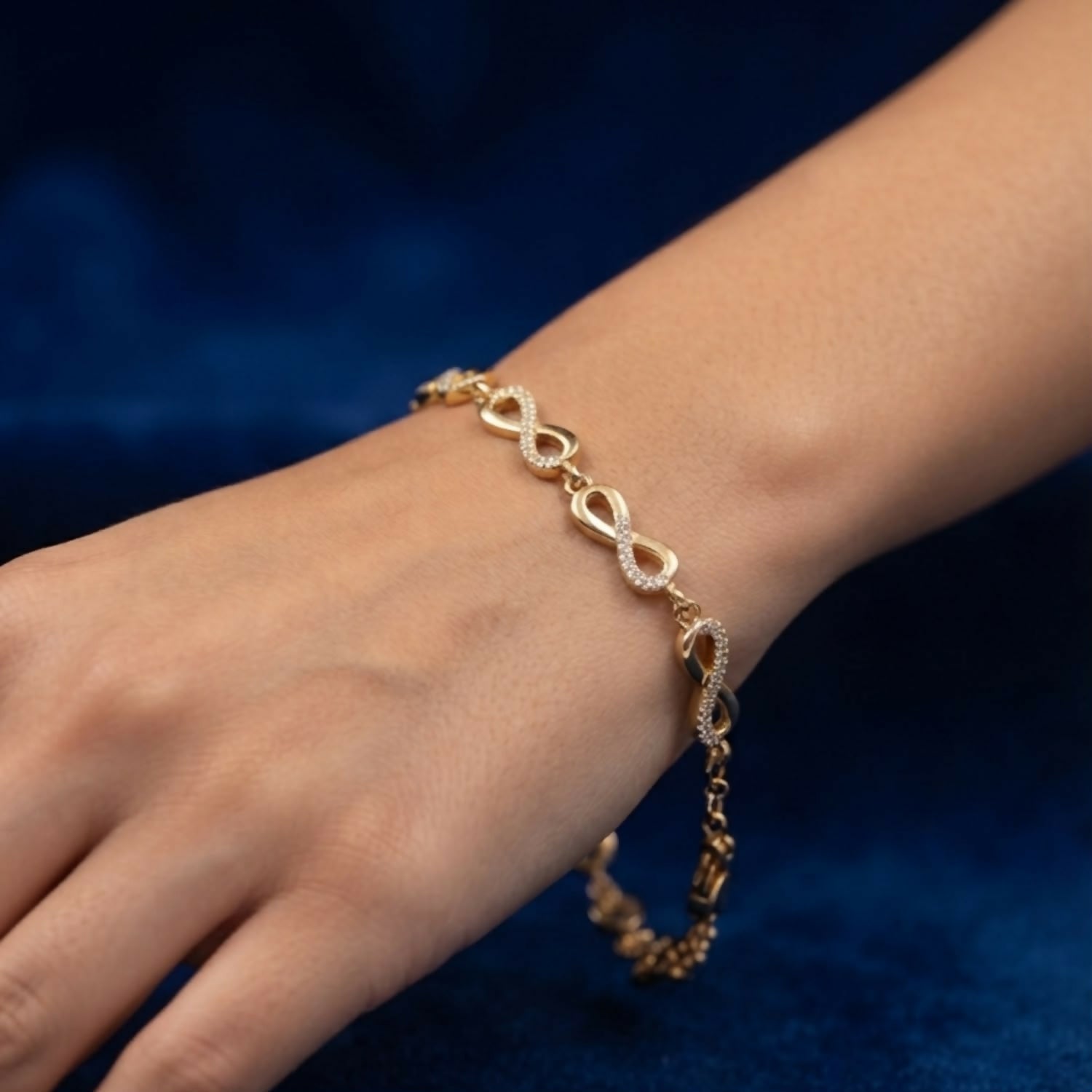 Gold-Tone Infinity Link Bracelet with Crystal Accents and Adjustable Chain for Women