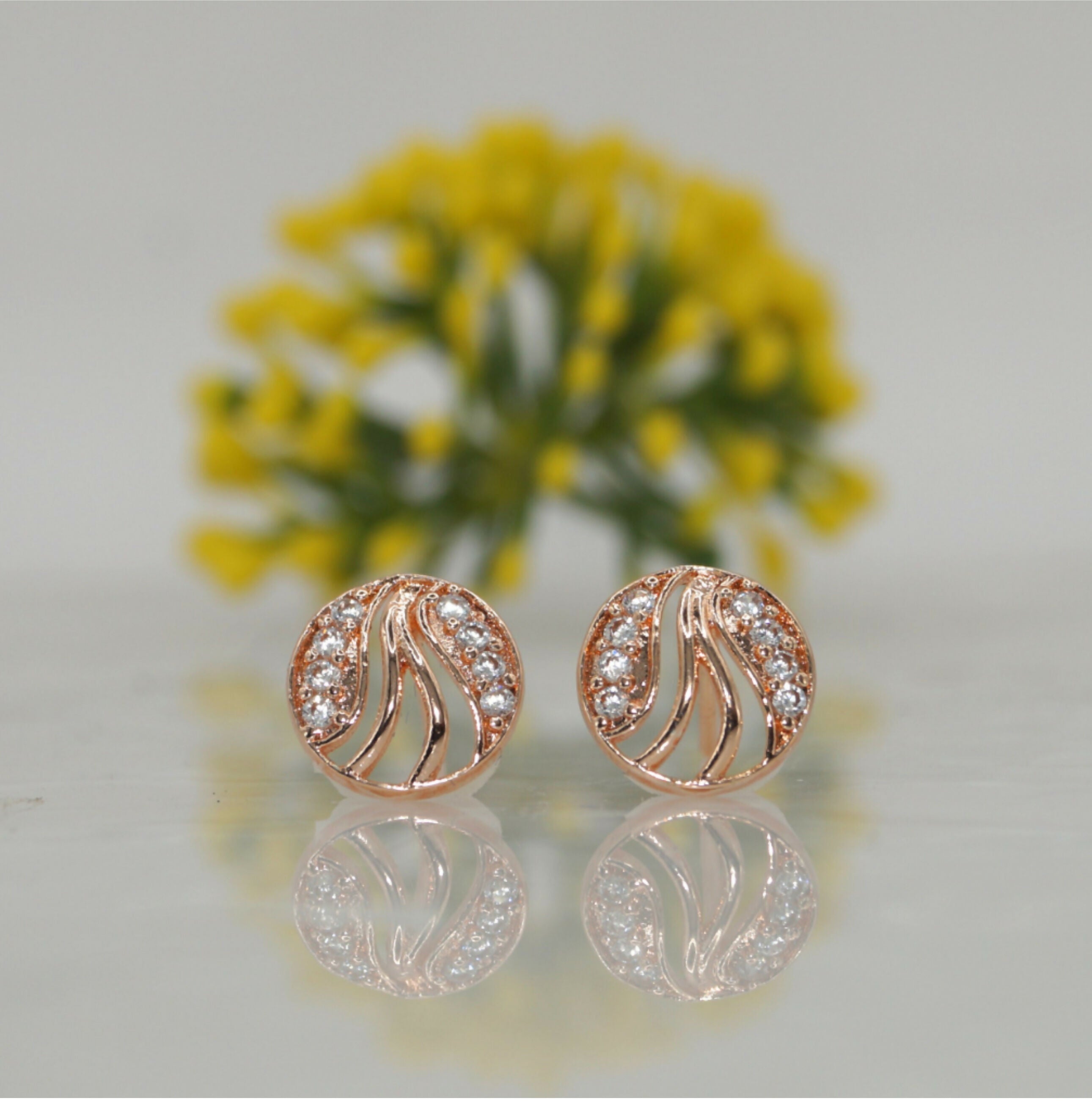 Rose Gold Swirl Stud Earrings – Elegant Cubic Zirconia Sparkle