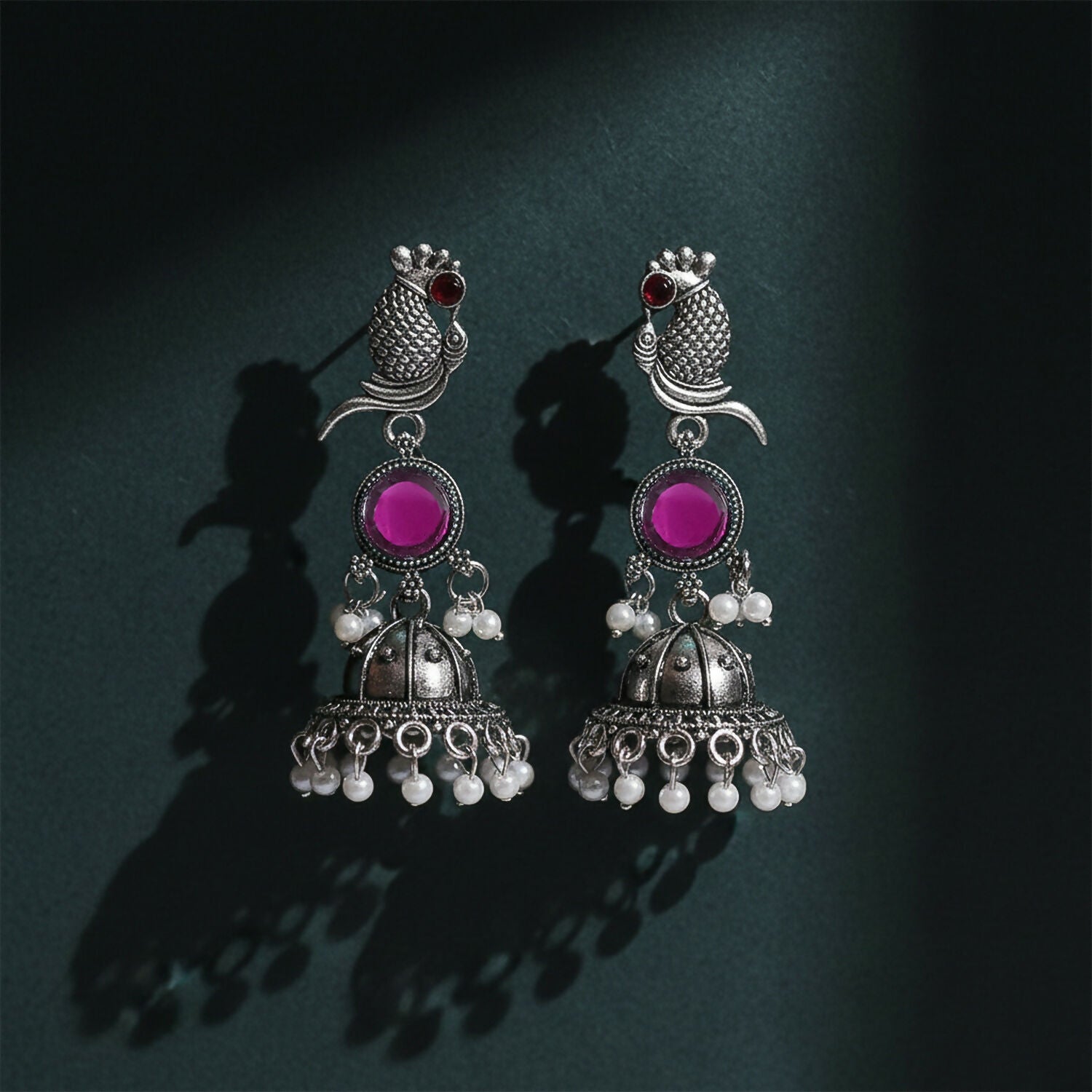 Oxidised Silver Peacock Jhumka Earrings with Pink Stone and Pearl Drops for Women